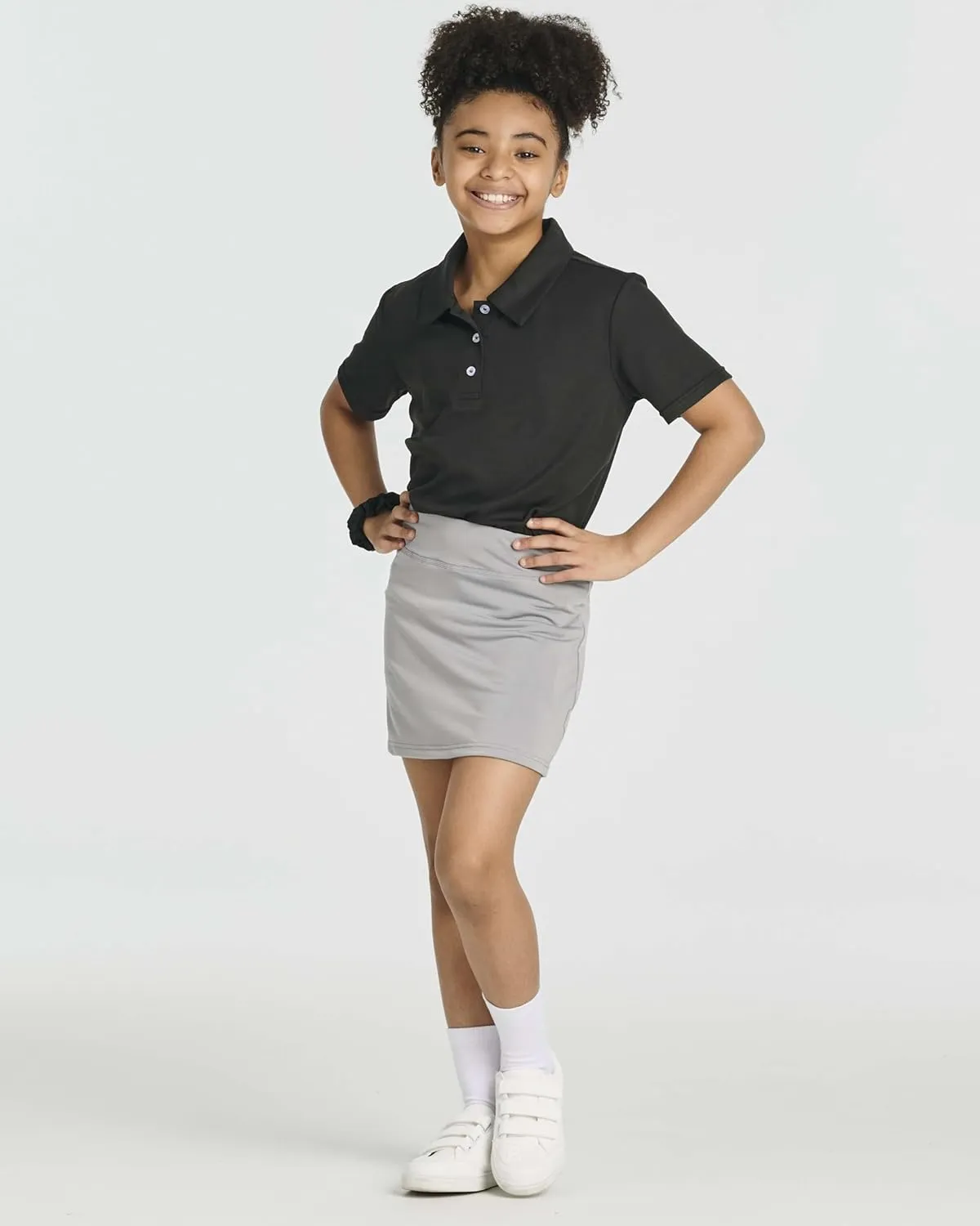 Real Essentials 4 Pack: Girls' Active Skort Athletic Performance Skirt - Tennis Golf Skirt with Bike Short Lining (4-16)